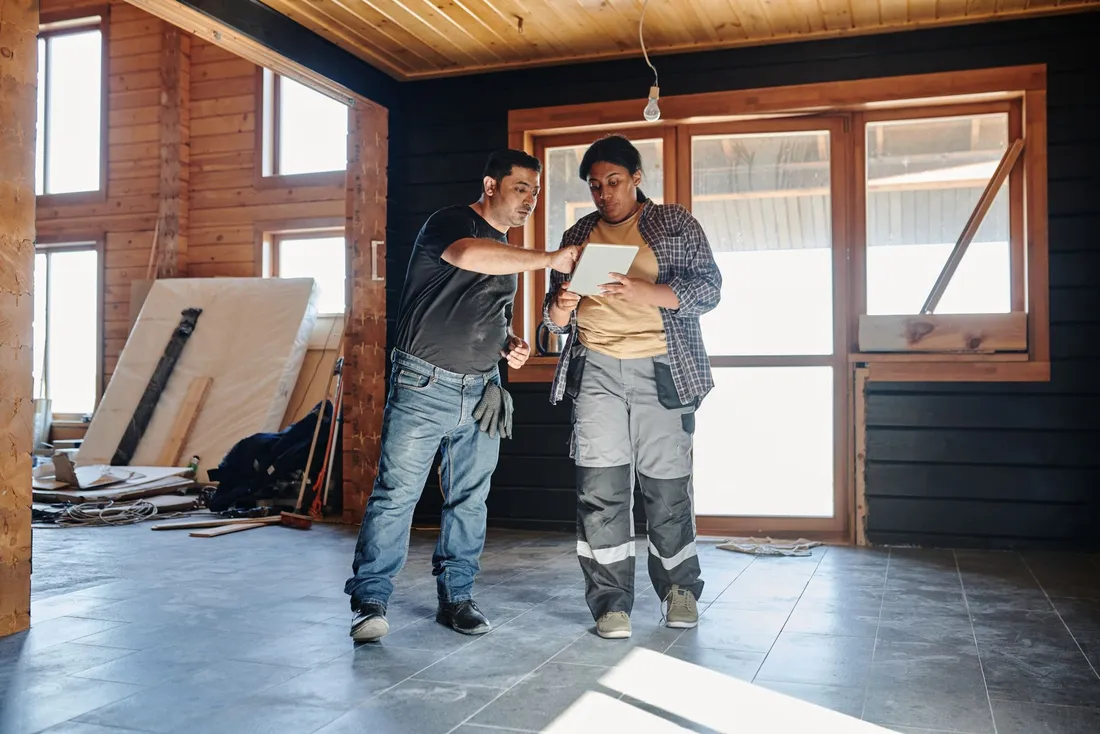 Contractor going through acceptance paperwork on site
